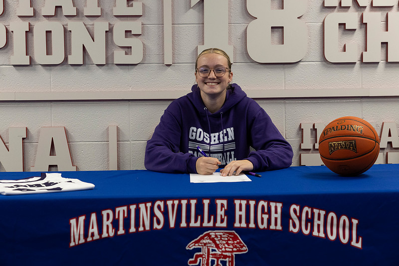 Connie Etter Photography | Ruby - Signing Basketball